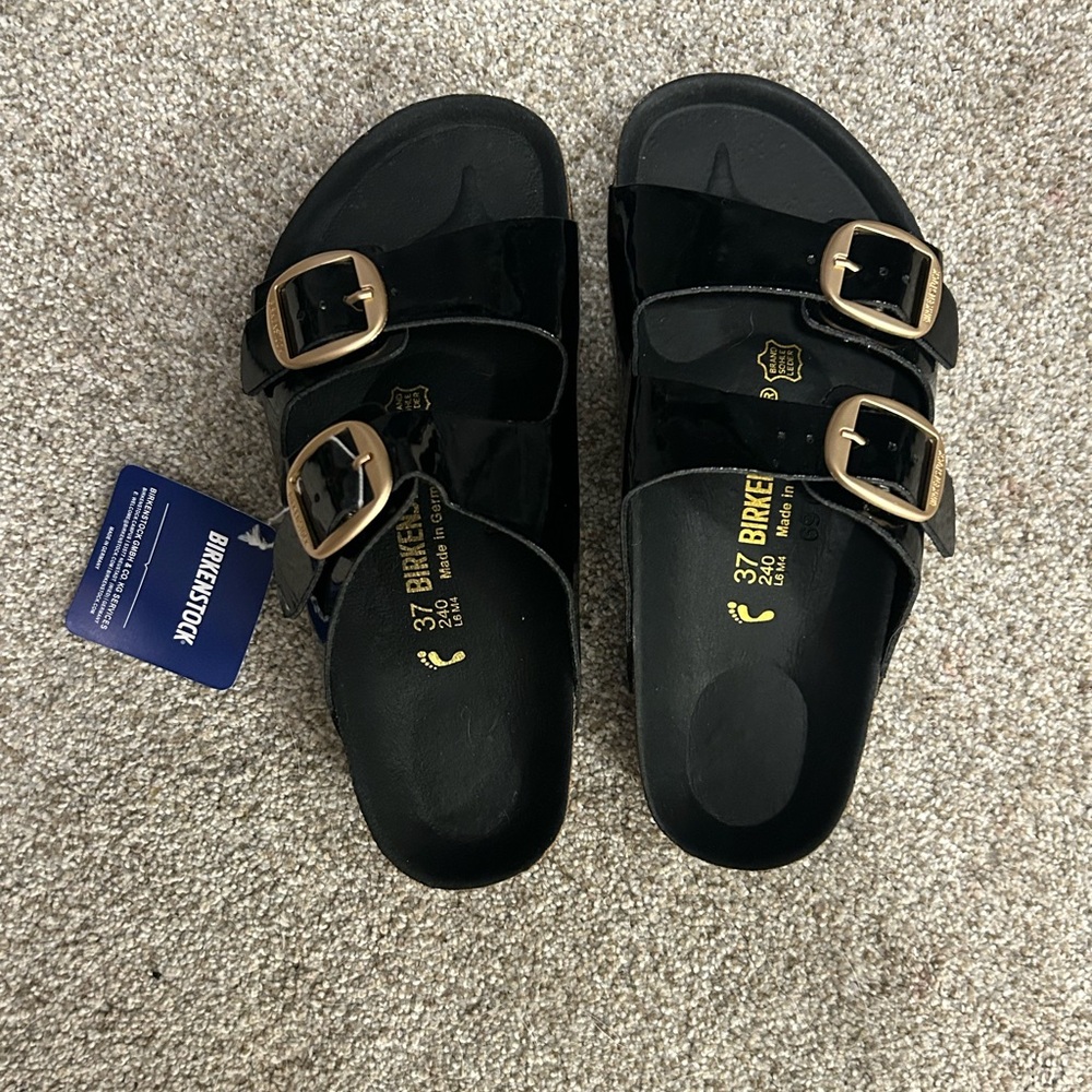 Birkenstock Black Sandals with Gold Accents